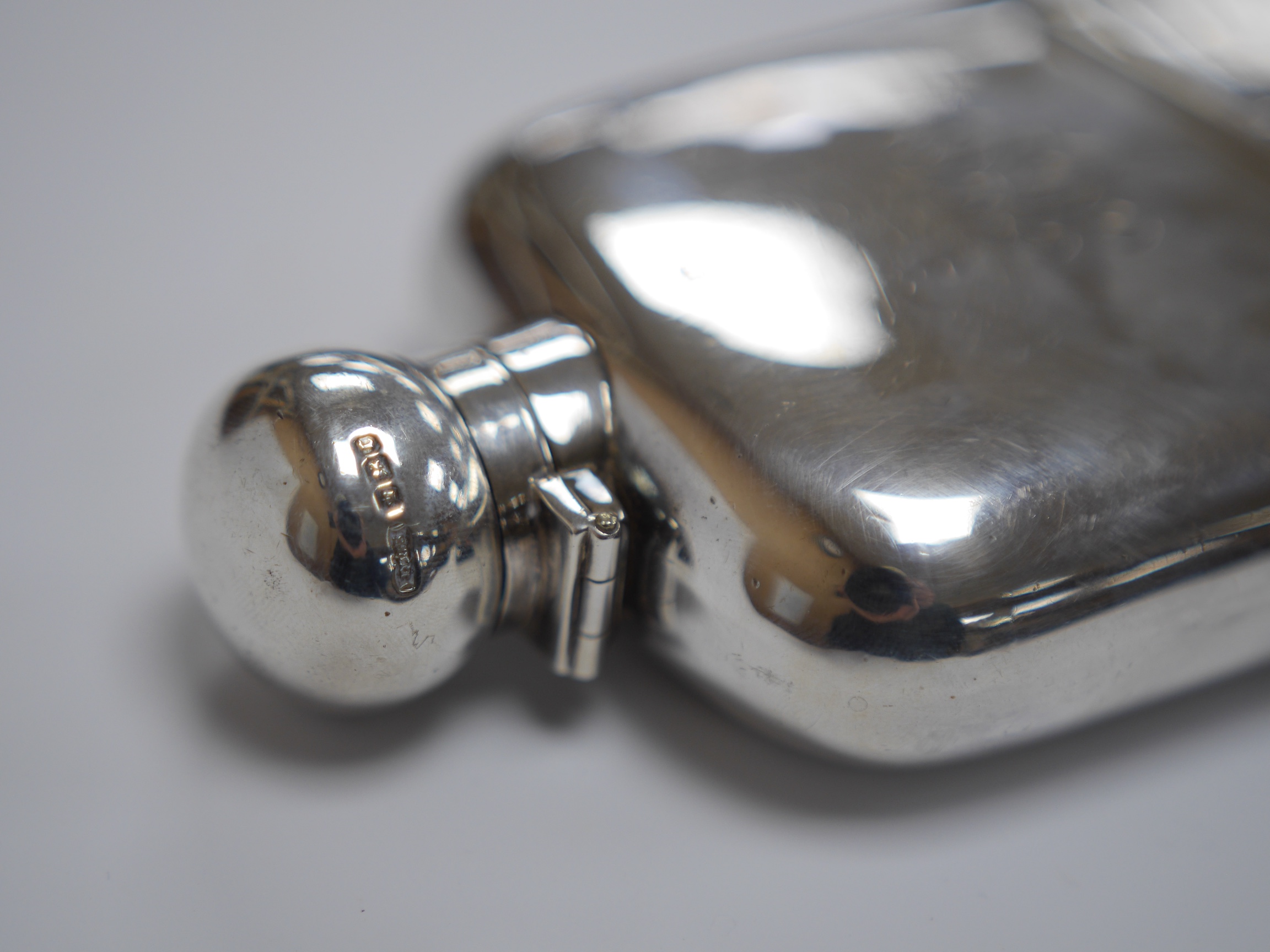 A late Victorian silver hip flask, by James Dixon & Sons, Sheffield, 1895, with engraved monogram, 15.5cm, 7.3oz. Condition - fair